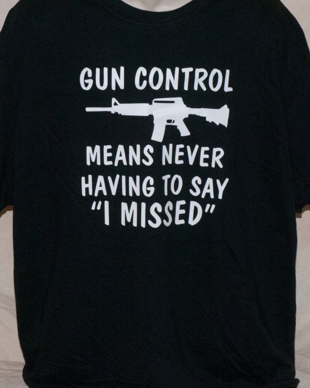 7006 GUN CONTROL MEANS NEVER HAVING TO SAY 