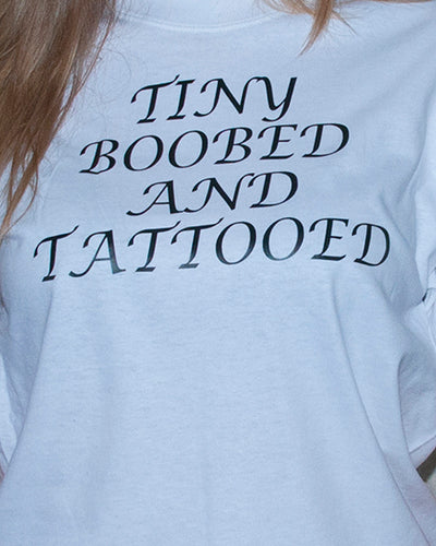 1050 Tiny boobed and tattooed